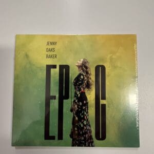 A cd cover with the word " epic " written in front of a woman.