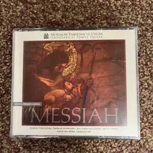 A cd of the messiah is shown on the floor.