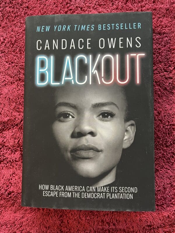 A book cover with the title of black out.