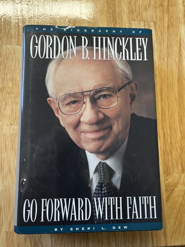 A book cover with an older man wearing glasses.