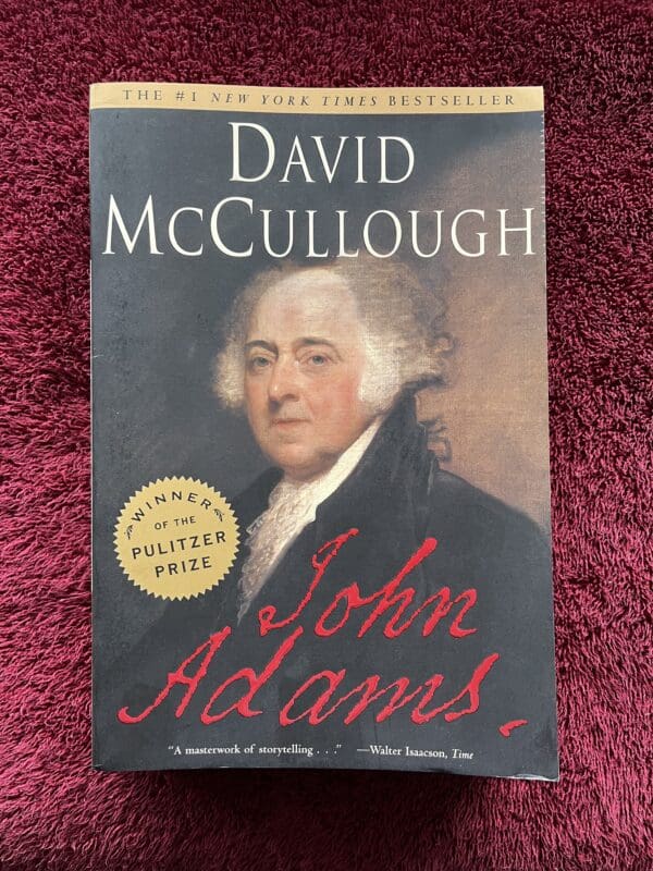 A book cover with an image of president john adams.