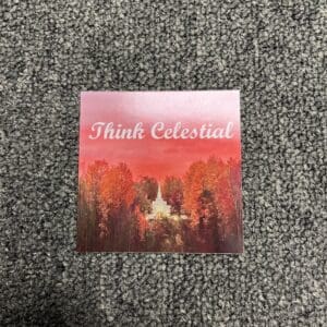 A square sticker with trees and the words " think celestial ".