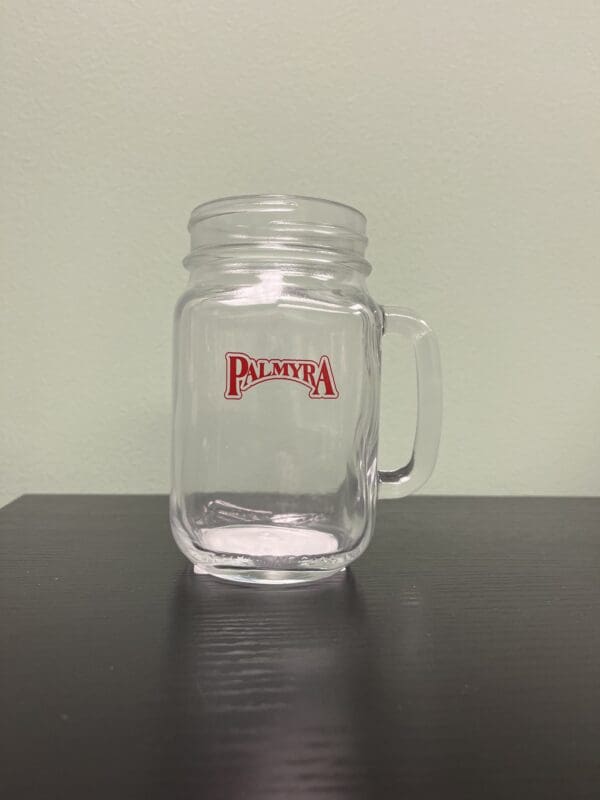 A mason jar with the name pomona on it.