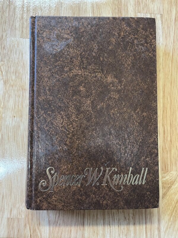 A brown book with the name of steven w. Kimball on it