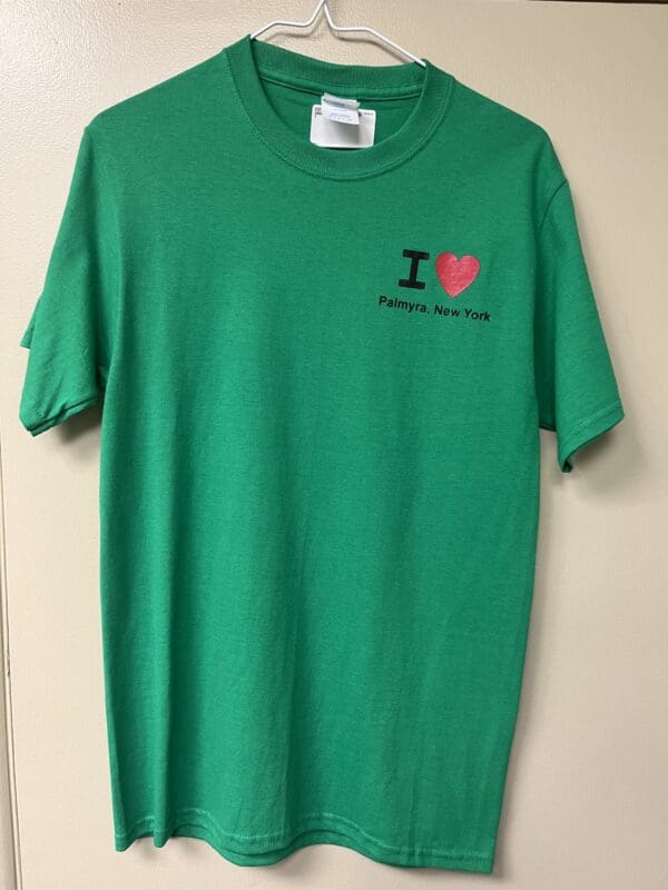 A green shirt with the words " i love florida beaches ".