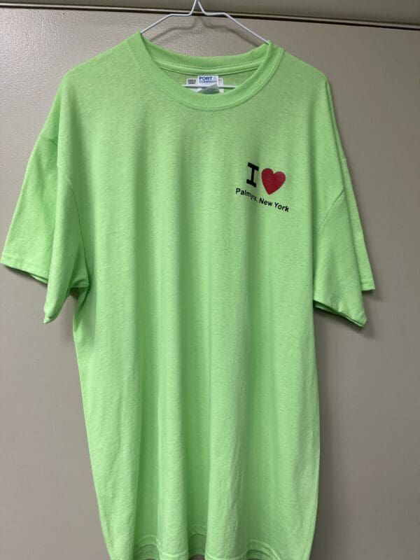 A neon green shirt with the words " i love " on it.