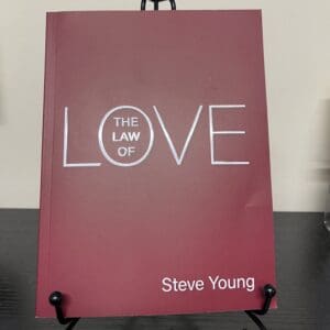 A book cover with the title " the law of love ".