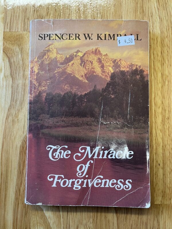 A book cover with the title of the miracle of forgiveness.