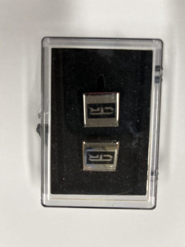 A picture of two usb sticks in a case.