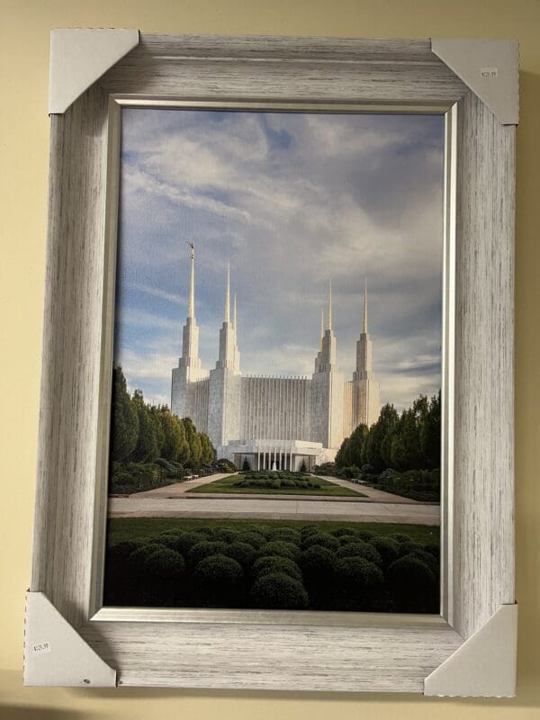 Here's an 8-word alt tag for the image: Temple framed photograph, serene landscape, peaceful setting.