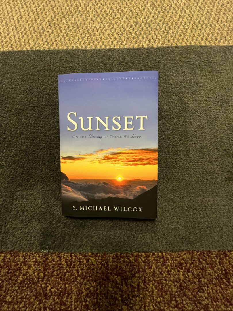 A book sitting on top of a carpet.