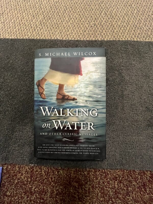 A book cover with the title walking in water.