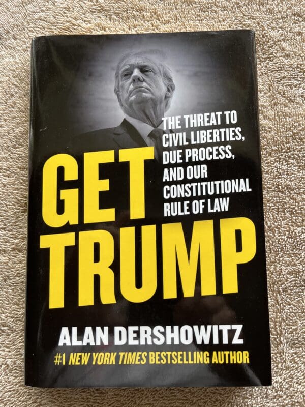 A book cover with an image of president donald trump.